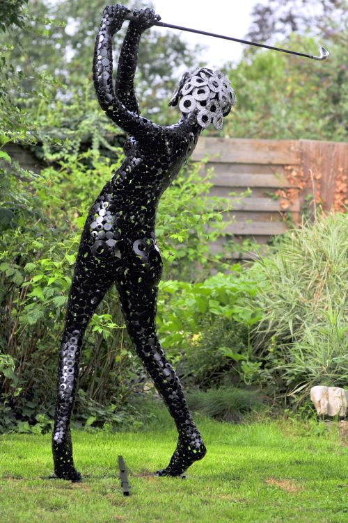 joueuse de golf en metal
